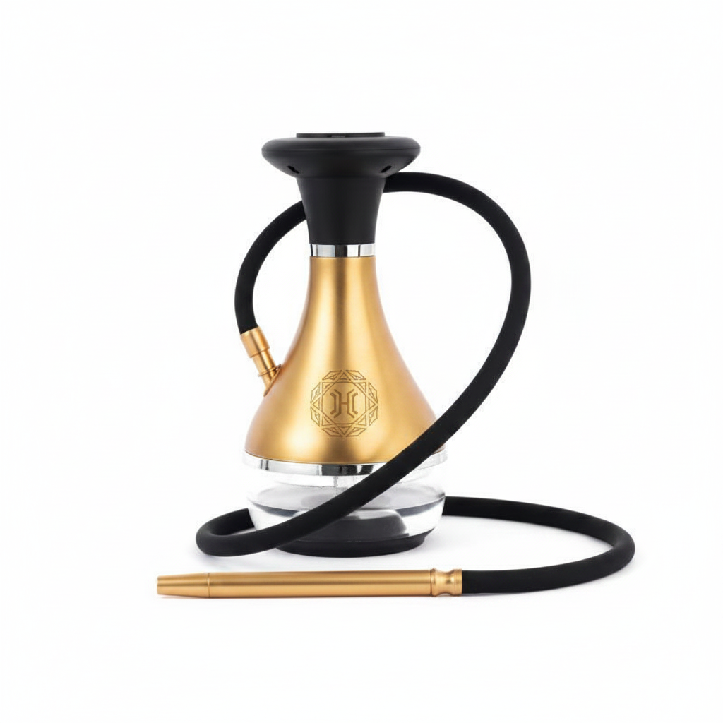 A close-up of a custom-branded electric hookah with a laser-etched logo on a brushed gold finish.