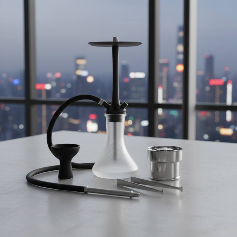 A complete shisha starter kit with bowl, hose, tongs, and HMD neatly arranged